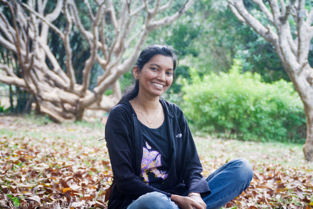 Abby, sitting in the leaves at Lalbag