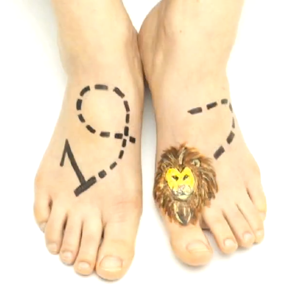 Two feet side by side, with a marker illustration on them. theres  a figure 1 on one foot. a small cartoon lion on the other. and a dashed path drawn across one foot to the other, linking them.
