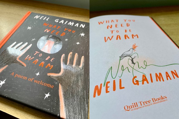 A signed copy, of Neil Gaiman’s book, “What you need to be warm”